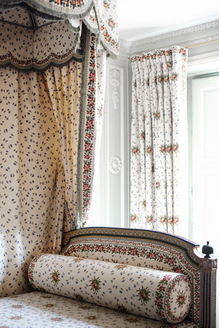 Eccentric duvet pattern that matches the curtains and headboard drapery.